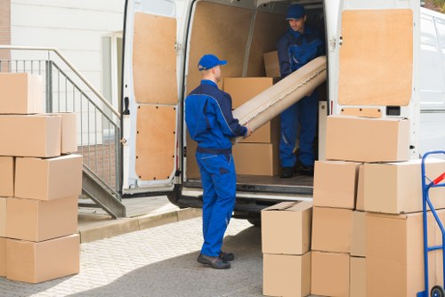 Van loading scene showing safe handling practices
