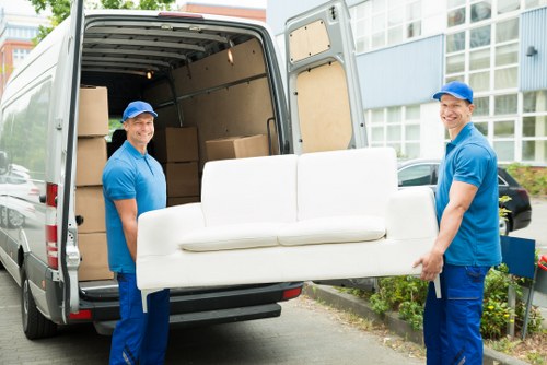 Moving van ready for a local move in Merton on a residential street