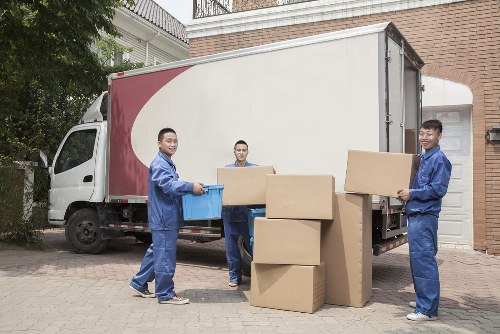 Man and van loading furniture for a local move in Merton