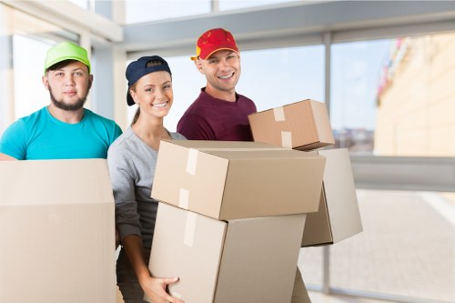 Packed moving boxes ready for a house relocation in Merton