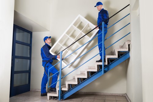 Office removals planning in Merton with packed business equipment