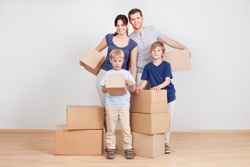 Preparing belongings for a home move in Merton with careful packing