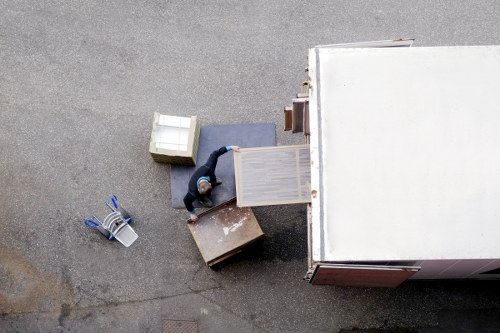 Local movers in Merton carrying household items safely