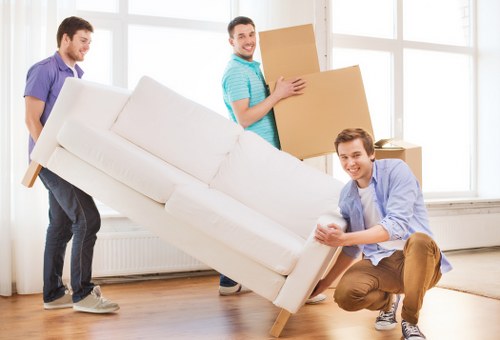 Professional movers handling a family home relocation in Merton