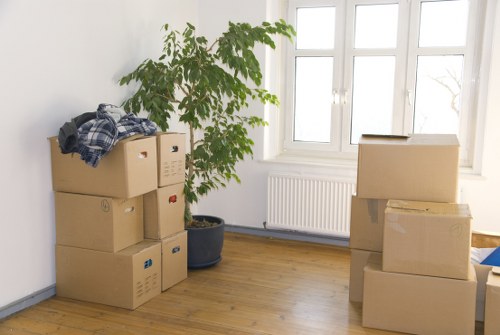 Reusable furniture and cardboard prepared for recycling or donation