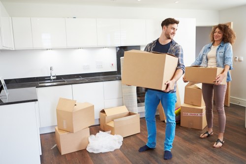 Van moving team wearing PPE during a relocation