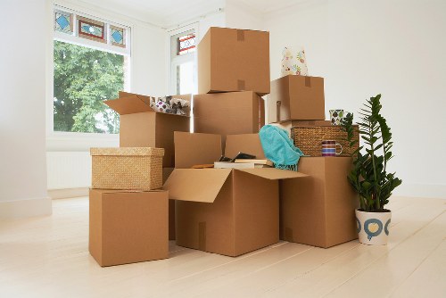 Boxes and furniture prepared for man and van collection in Merton