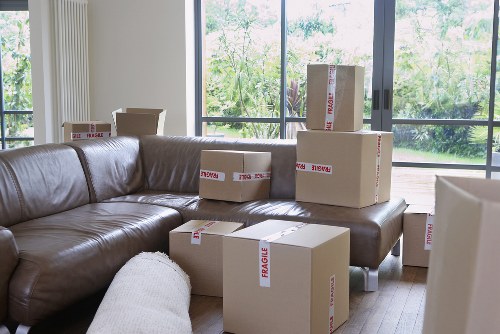 Loading furniture safely into a moving truck in Merton